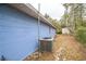 Blue home exterior showing the AC unit, and side of the house at 2935 Apaloosa Trl, Deltona, FL 32738