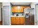 Kitchen area featuring stainless steel appliances and ample storage at 2935 Apaloosa Trl, Deltona, FL 32738