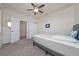 Bedroom featuring neutral colored walls and carpet, and a ceiling fan with light at 3018 Jardin St, Kissimmee, FL 34741
