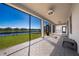 Enjoy serene water views from the comfort of this expansive screened lanai at 3018 Jardin St, Kissimmee, FL 34741