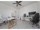 Bright home office with modern furniture and ample space for work or study, ensuring comfort and productivity at 3018 Jardin St, Kissimmee, FL 34741