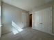 Neutral bedroom includes large double door closet and a separate entry way at 3108 Firethorn Cir, Daytona Beach, FL 32124