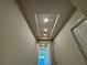 Hallway featuring recessed lighting and access to various rooms in the house at 3108 Firethorn Cir, Daytona Beach, FL 32124
