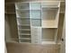 Well-organized walk-in closet with ample shelving and drawers for optimal storage solutions at 3108 Firethorn Cir, Daytona Beach, FL 32124