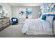 Serene bedroom with soft lighting, stylish decor, and a comfortable bed for relaxation at 313 Castle Dr, Lake Alfred, FL 33850