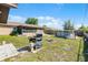 The backyard has a shed, a grill, a pool, and a wood fence at 3141 Wainwright St, Deltona, FL 32738
