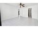 Bedroom showcasing tile floors and access to the en-suite bathroom at 3141 Wainwright St, Deltona, FL 32738