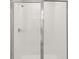 Close up of a shower with white tiles and glass door at 317 Castle Dr, Lake Alfred, FL 33850
