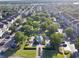 Aerial view of the neighborhood featuring manicured green spaces and a lovely gazebo at 3291 Westchester Square Blvd # 203, Orlando, FL 32835