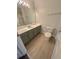 Bathroom featuring a single sink vanity with an oversized countertop and modern cabinets at 3291 Westchester Square Blvd # 203, Orlando, FL 32835