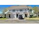 Charming two-story townhome with attached garage and inviting curb appeal in a desirable neighborhood at 3291 Westchester Square Blvd # 203, Orlando, FL 32835