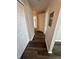 Hallway view with storage closets and access to other rooms at 3291 Westchester Square Blvd # 203, Orlando, FL 32835