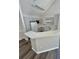 Kitchen boasts white cabinets and ample counter space at 3291 Westchester Square Blvd # 203, Orlando, FL 32835