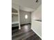 Cozy loft area with wood floors and unique oval window at 3291 Westchester Square Blvd # 203, Orlando, FL 32835