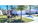 Inviting single-Gathering home featuring a two-car garage, landscaped lawn, and beautiful curb appeal at 3538 Treetop St, Deland, FL 32724
