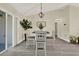 Bright dining area with modern finishes and views of the sliding door at 416 Lancaster Ave, Orange City, FL 32763