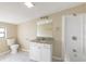 Bathroom with shower and tub combo, granite vanity, and marble tile floor at 4192 Gallimore St, Orlando, FL 32811