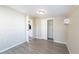 Bedroom includes a closet and air conditioner, with new paint and flooring at 4192 Gallimore St, Orlando, FL 32811