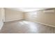 This room has vinyl flooring, a window, and a closet at 4192 Gallimore St, Orlando, FL 32811
