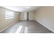 Large bedroom with vinyl flooring, a window, and closet at 4192 Gallimore St, Orlando, FL 32811
