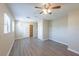 Bedroom featuring ceiling fan, light wood flooring, closet and natural light from window at 4192 Gallimore St, Orlando, FL 32811