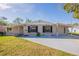 Charming single-story home with a well-maintained lawn and inviting curb appeal at 4192 Gallimore St, Orlando, FL 32811