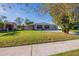 Quaint single-story home with green lawn at 4192 Gallimore St, Orlando, FL 32811
