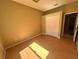 Bedroom with wood floors and closet at 450 Dewars Ct, Winter Springs, FL 32708