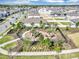 Aerial view of the community playground surrounded by well-maintained landscaping at 493 Talisi Loop, St Cloud, FL 34771