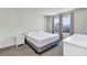 Bright bedroom featuring neutral walls and carpet, with great natural light from the double window at 493 Talisi Loop, St Cloud, FL 34771