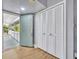 Bright entryway with wood flooring, closet space, and doorway leading to an outdoor porch at 5036 Sherwood Ln # 3945-6, Haines City, FL 33844