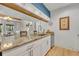 Bright kitchen featuring granite countertops, white cabinets, and modern stainless steel appliances at 5036 Sherwood Ln # 3945-6, Haines City, FL 33844