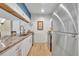 Modern kitchen with white cabinets, granite countertops, and stainless steel appliances at 5036 Sherwood Ln # 3945-6, Haines City, FL 33844