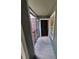 Balcony view showing the entrance to the unit with a black door and a white-framed window at 5064 Park Central Dr # 1731, Orlando, FL 32839