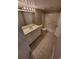 Bathroom with a white vanity, sink, toilet, and a shower-tub combo; features neutral walls and tiled flooring at 5064 Park Central Dr # 1731, Orlando, FL 32839