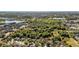Birds eye of neighborhood and the surrounding nature offering a sense of community in a leafy environment at 5108 Legacy Oaks Dr, Orlando, FL 32839