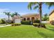 Charming single-Gathering home with mature landscaping, a manicured lawn, and a two-car garage at 5108 Legacy Oaks Dr, Orlando, FL 32839