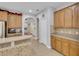 Well-designed kitchen with tiled backsplash, stainless steel appliances, and adjacent dining area at 5108 Legacy Oaks Dr, Orlando, FL 32839