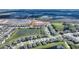 New development aerial view of a home by the water; a serene residential community at 5645 Camilla St, St Cloud, FL 34771