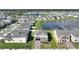 Aerial view of the neighborhood with lush landscaping, ponds, and modern homes at 5645 Camilla St, St Cloud, FL 34771