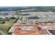 Expansive aerial view of home in a community with ponds and future development; perfect location at 5645 Camilla St, St Cloud, FL 34771