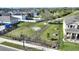 Aerial view of community dog park with benches and greenery at 5645 Camilla St, St Cloud, FL 34771