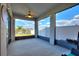 Screened patio with ceiling fan, view of the backyard, and outdoor seating at 5645 Camilla St, St Cloud, FL 34771