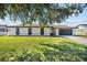 Charming single-story home with a well-manicured lawn and welcoming curb appeal at 607 Dunblane Dr, Winter Park, FL 32792