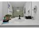 Bright bathroom vanity with sleek fixtures, cosmetic amenities, and a modern design for a refreshing experience at 6165 Carrier Dr # 3701, Orlando, FL 32819