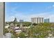 Expansive city view featuring buildings and landscaping under a blue sky at 6165 Carrier Dr # 3701, Orlando, FL 32819