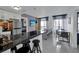 Contemporary condo featuring an open floor plan, living room, and kitchen at 6165 Carrier Dr # 3701, Orlando, FL 32819