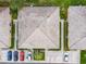Aerial view of the property highlighting roof, parking, and landscaping in a residential neighborhood at 619 Lake Marion Golf Resort, Kissimmee, FL 34759