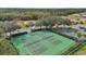 Aerial view of tennis courts and a basketball court, perfect for active community residents at 619 Lake Marion Golf Resort, Kissimmee, FL 34759