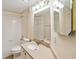 Clean bathroom with a single vanity, ample lighting, and a well-maintained shower-tub combination at 640 Cranes Way # 164, Altamonte Springs, FL 32701